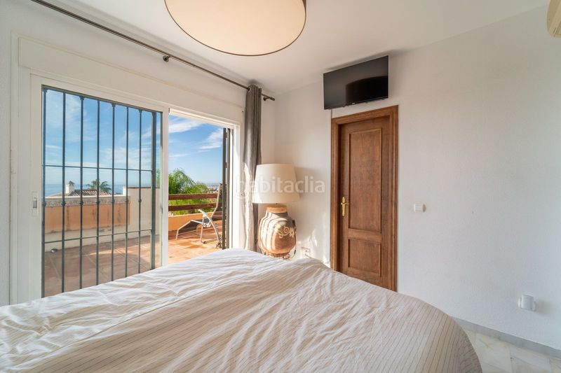 Foto 20a60216-ff37-4946-bfdf-423f5944978d. Casa adossada amb aparcament a Las Lomas de Río Verde Marbella