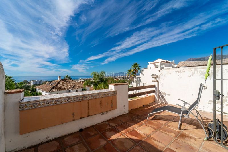 Foto 548b3dda-d01a-4213-90f4-9cbadd59ff91. Casa adossada amb aparcament a Las Lomas de Río Verde Marbella