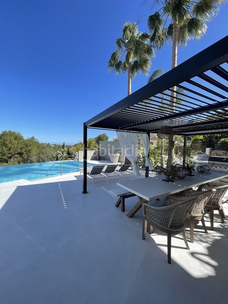 Foto 4bd0367f-41f9-412e-8041-60ea6263eca4. Casa amb aparcament piscina a Elviria Marbella
