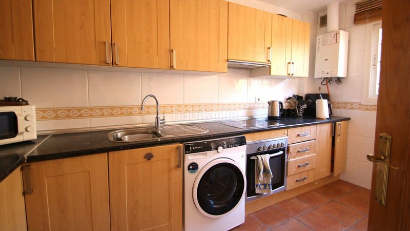 Foto 0f1d5349-4eb7-4d19-a868-aed7d4b8afe3. Casa amb aparcament a Los Pacos Fuengirola