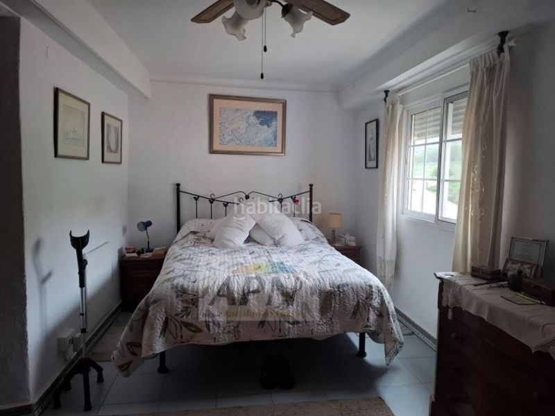 Foto 38f3f6b5-6c5e-49ac-a432-9db961d8c748. Casa adossada a Álora