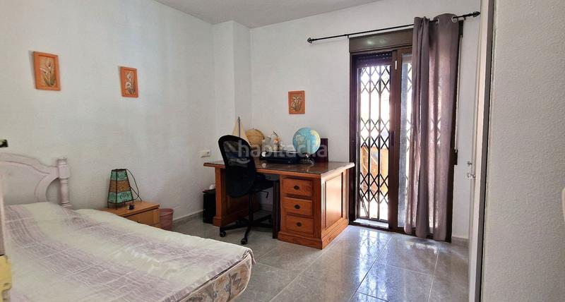 Foto 127a13d4-69be-4f1b-b97a-6e2bdf9d1873. Casa en calle pirineos 68 en Villamartín-Las Filipinas Orihuela