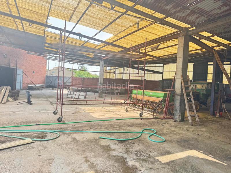 Foto 1604204c-6875-430a-93ec-d21a949da457. Bâtiment à usage industriel dans Urdiales del Páramo