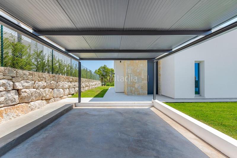 Foto a5c9455c-bbf7-4e03-bf5b-0701e1dd8a77. Xalet amb aparcament piscina a Golf Bahía Finestrat