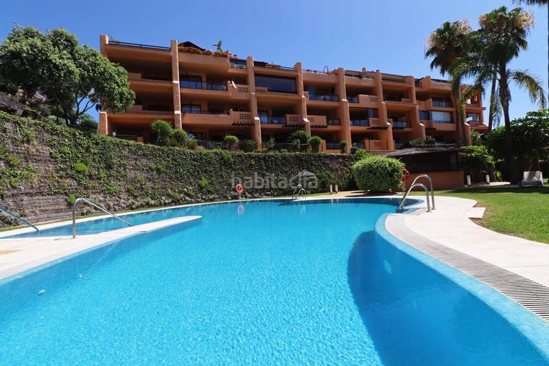 Foto 4c85ab6b-cafd-4110-a9dd-ea6aa21da2ea. Planta baja apartamento con amplia terraza en calanova golf en Mijas
