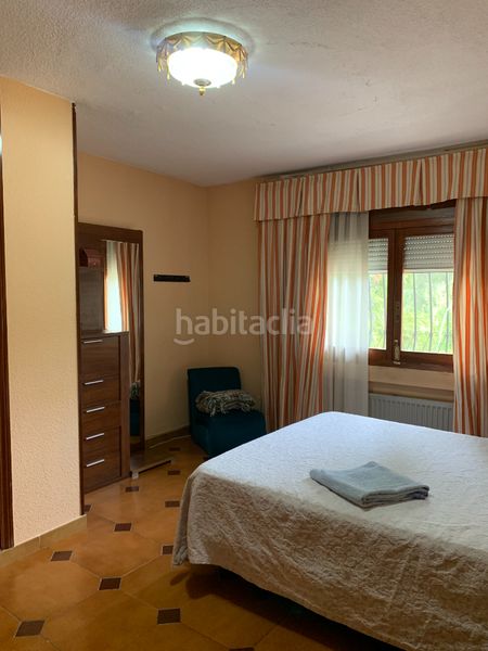 Foto a151b24d-b025-4c96-8384-7a86ec953e49. Xalet amb xemeneia calefacció aparcament piscina a Valdemorillo