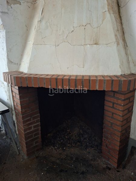 Foto 9496d135-0fa6-4b12-ad58-1ffe1f61a3b4. Casa amb xemeneia calefacció a Puebla de Almoradiel (La)