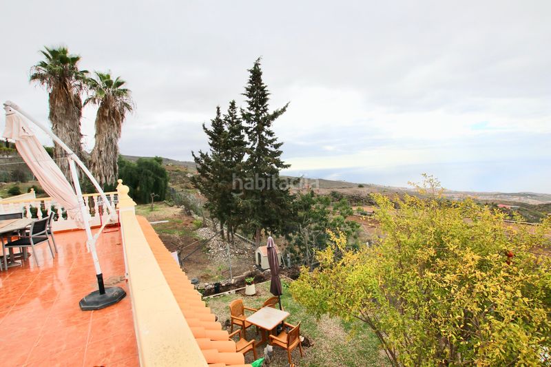 Foto bbb7420c-d107-4662-aed1-1df2d23a0eec. Xalet amb xemeneia calefacció aparcament piscina a Guía de Isora