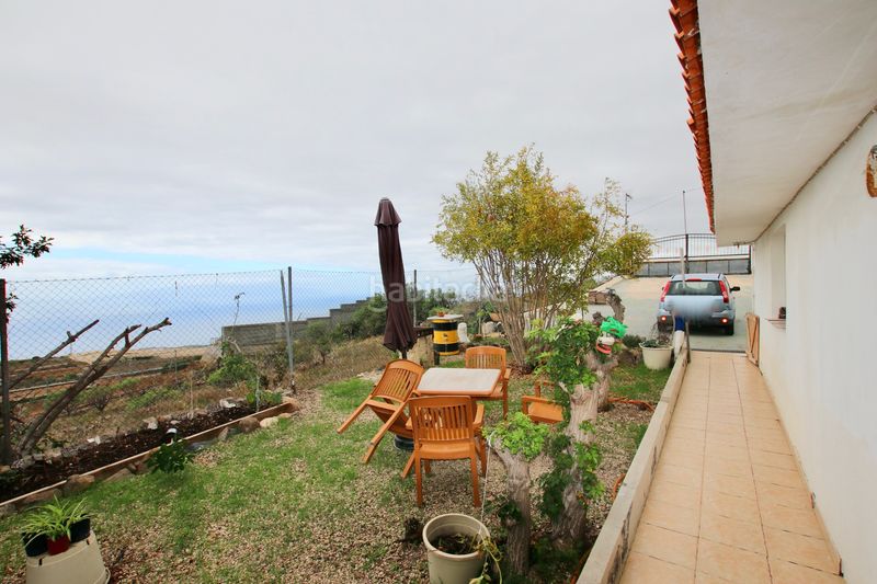 Foto e28989a4-9990-40a1-96fe-f0d512ae8912. Xalet amb xemeneia calefacció aparcament piscina a Guía de Isora