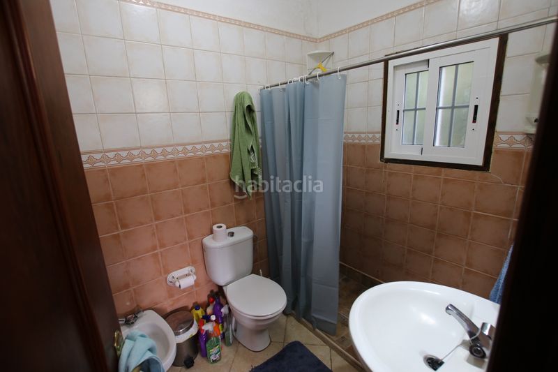 Foto f07dd9e6-b739-4ebf-969f-cbb4eac3c510. Xalet amb xemeneia calefacció aparcament piscina a Guía de Isora