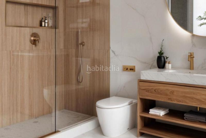 Foto f19fc072-d84a-469f-921b-2698c211343d. Planta baixa 48m<sup>2</sup> amb calefacció aparcament piscina a Gijón