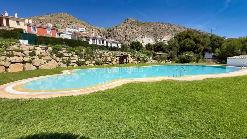 Foto acf0e401-f8f6-46ee-862c-6b55cfb1b795. Casa adossada amb piscina a Golf Bahía Finestrat