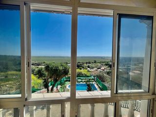 Casa adossada a charco roto alto