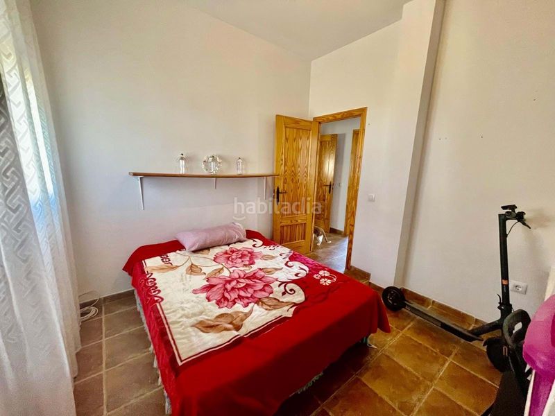 Foto e9186805-d855-4b1d-a4f9-c575ffce9357. Casa adossada a Almodóvar del Río