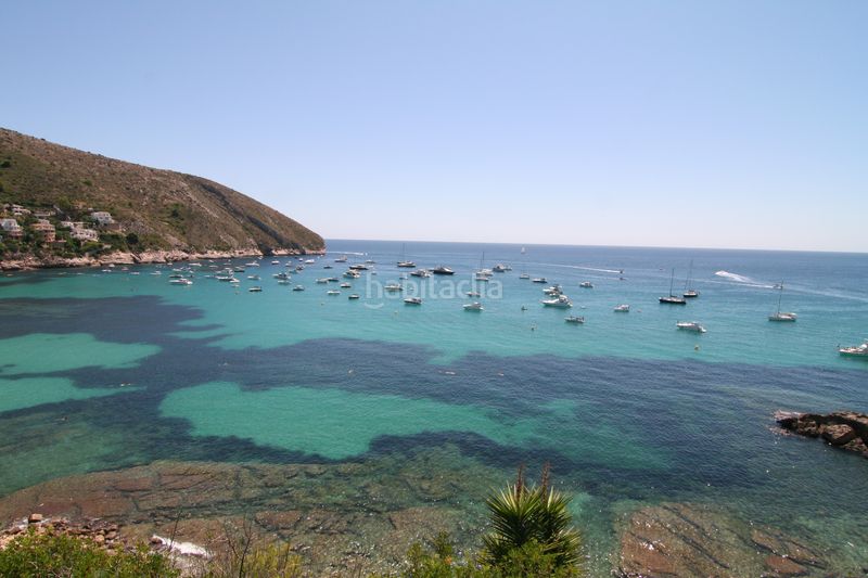 Foto f8e7d3fa-2de5-4a40-bc23-f56445f0e060. Terreny residencial a Casco Urbano Moraira