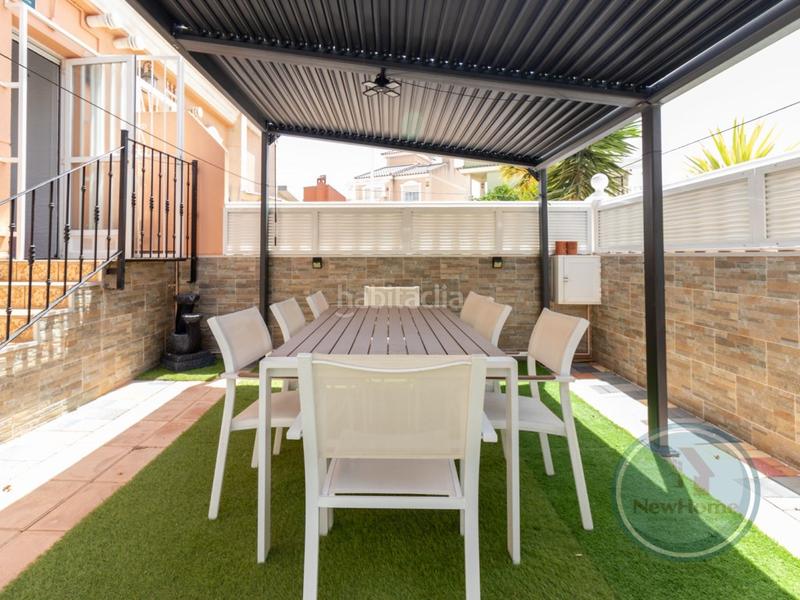 Foto 3281100d-5311-406c-9f7d-d0f6e174f827. Casa a schiera con parcheggio piscina in Puerto Marino Santa Pola