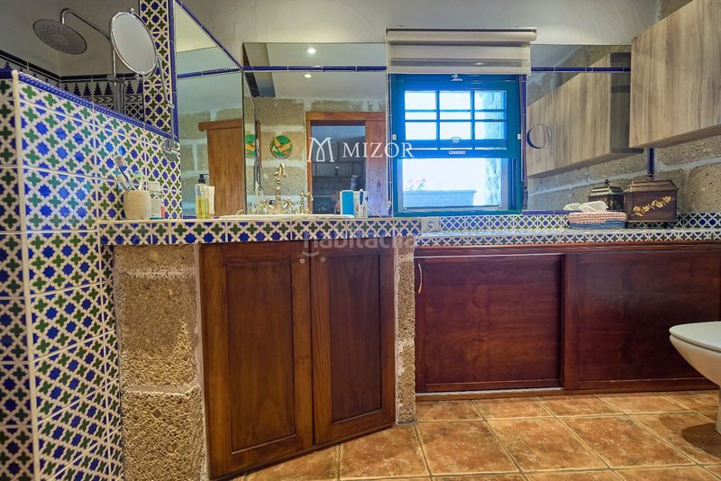 Foto 74ad4f5f-a866-4172-963c-a2d6ae016956. Casa amb aparcament a Guía de Isora interior Guía de Isora