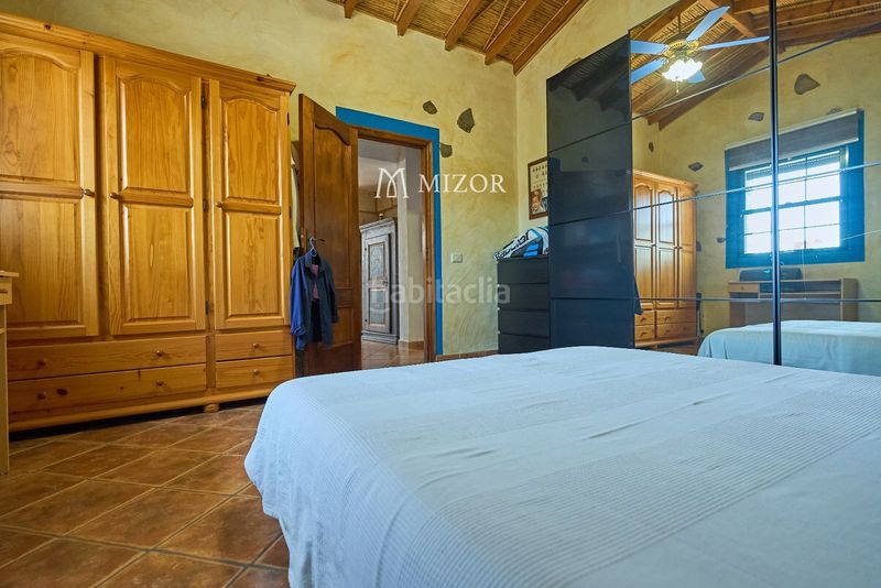 Foto 8c95b86c-9299-4cd5-8e1d-7b260742480f. Casa amb aparcament a Guía de Isora interior Guía de Isora