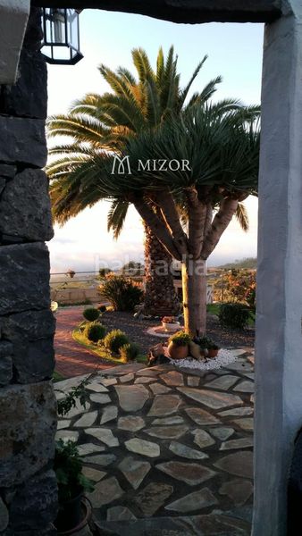 Foto ab2a2292-61a3-4460-a0f0-eeb3bedf8dfd. Casa amb aparcament a Guía de Isora interior Guía de Isora