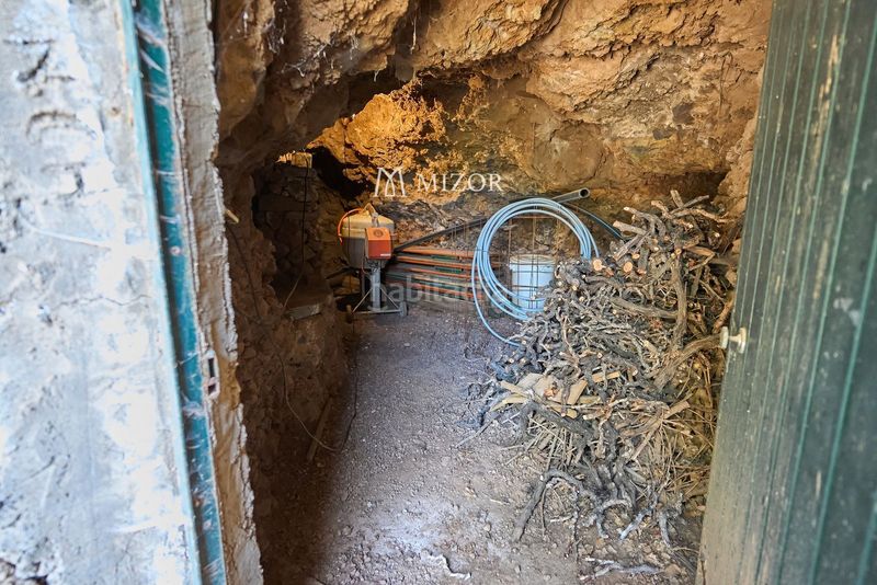 Foto c6dd644c-de85-4888-9836-bb22f0d640a4. Casa amb aparcament a Guía de Isora interior Guía de Isora