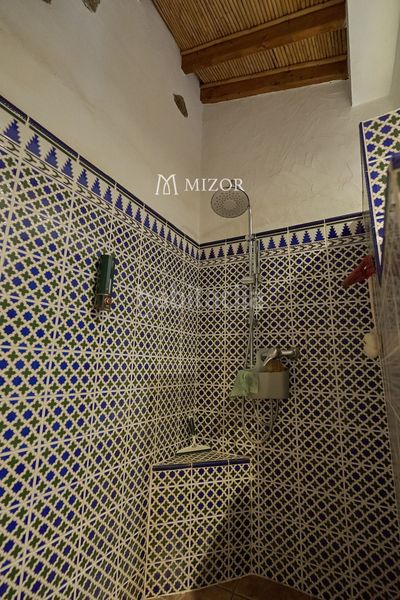 Foto cbffdc66-5f8c-44eb-a67a-9fcb10ac8833. Casa amb aparcament a Guía de Isora interior Guía de Isora
