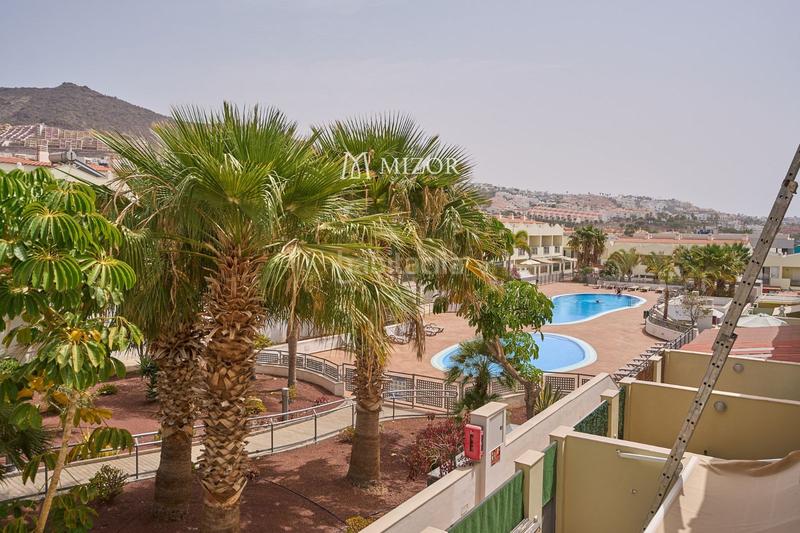 Foto 5bc7e495-7a64-464d-b853-1d80bb3c6b47. Casa a schiera con parcheggio piscina in Playa Fañabé Alto Adeje