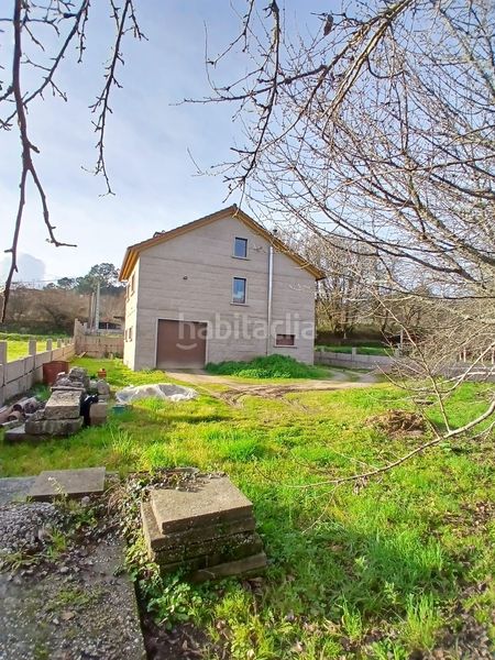 Foto f1432e64-2c0a-44fc-b5bc-13d6905c2eff. Casa amb aparcament a Ponteareas