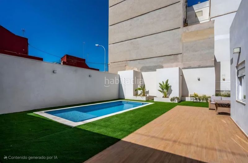 Foto b6083564-b314-40d4-b20f-e145ab28b29f. Maison avec parking dans Natzaret Valencia