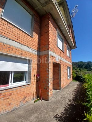 Foto 4d464b49-27c5-47bf-9a56-d72ac896414e. Casa amb aparcament a Tui