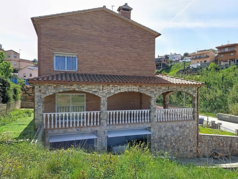 Foto c2d1c743-ffd0-43c2-af99-f22d9d8a2f0a. Casa amb aparcament a Masquefa