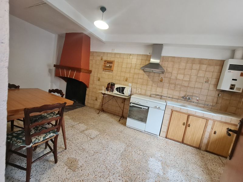 Foto c751d5c5-f121-4872-b24f-6a97077c420d. Casa amb aparcament a Navacarros