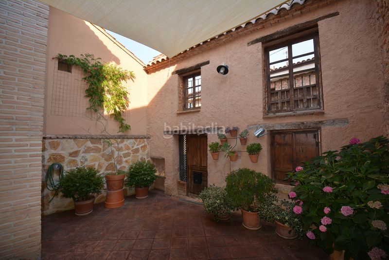 Foto f7bce1f4-8924-4d0a-ac68-b83193df76a6. Masia amb aparcament a Robledillo de Mohernando