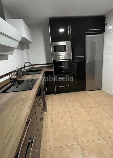 Foto 6a199e05-4a60-4547-92b1-6e7080fda12a. Casa adossada amb aparcament a Coín