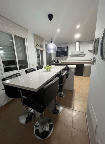 Foto ddc9e465-44bd-4b01-9f7b-40e01d1eb540. Casa adossada amb aparcament a Coín