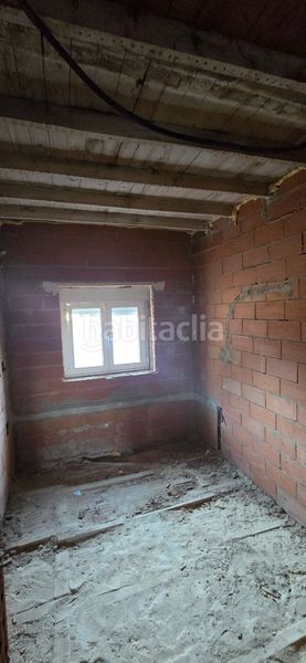 Foto 54d1f3df-67a3-4c13-8439-3bd428c45d7a. Casa adosada en Guardo