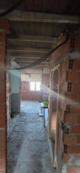 Foto 7bc8c9ea-ad00-4a5b-aaff-0098c1383049. Casa adosada en Guardo
