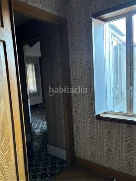 Foto bd9e5ac8-4b19-492e-aa2a-d677c19ede28. Casa con parcheggio in Marín