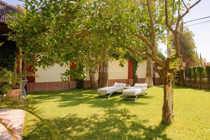 Foto b2c96675-fbcf-4285-8614-70db7766e1f9. Casa amb aparcament a San Lorenzo Sevilla