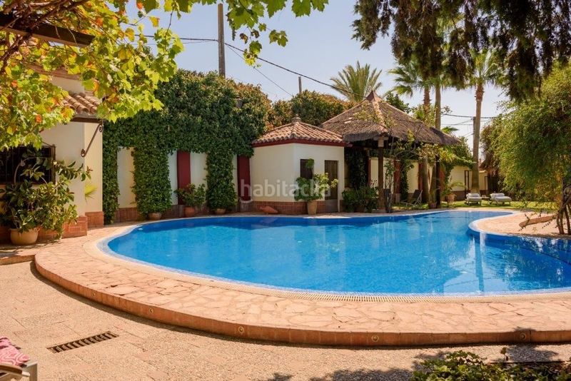 Foto e6114f12-8b5e-4a79-adaa-638a002e3243. Casa amb aparcament a San Lorenzo Sevilla