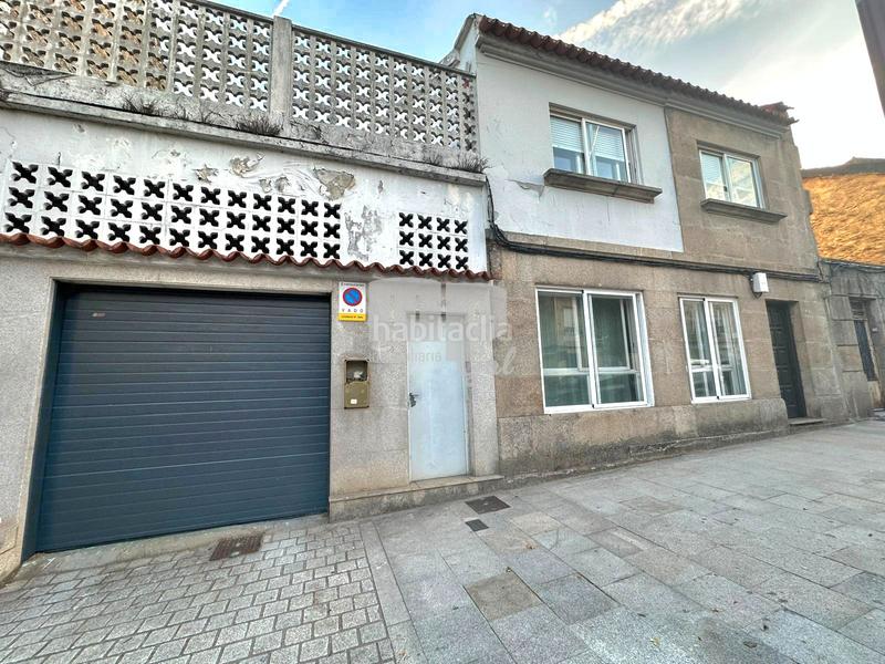 Foto 7f351362-9520-4edf-95a1-4b748d817c92. Maison jumelée avec cheminée chauffage parking dans Vigo