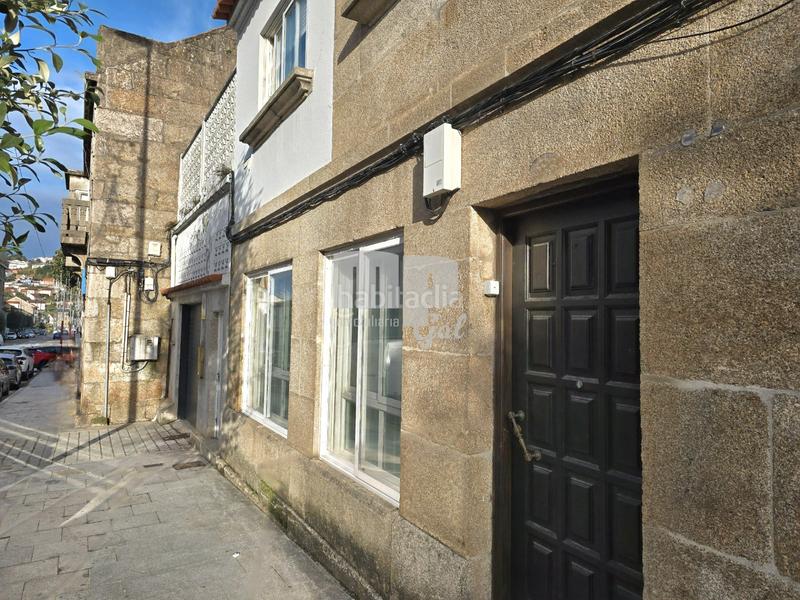 Foto 91437d85-f7d3-4cf9-b10d-6bc817548483. Maison jumelée avec cheminée chauffage parking dans Vigo