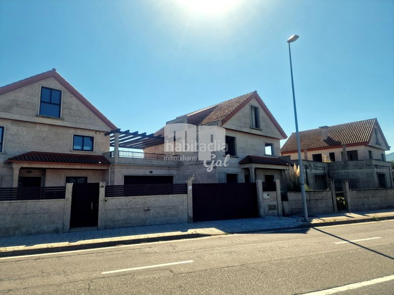 Foto e421c538-de62-43b7-8bf4-1b0f7f294cca. Towny house with parking in Baiona