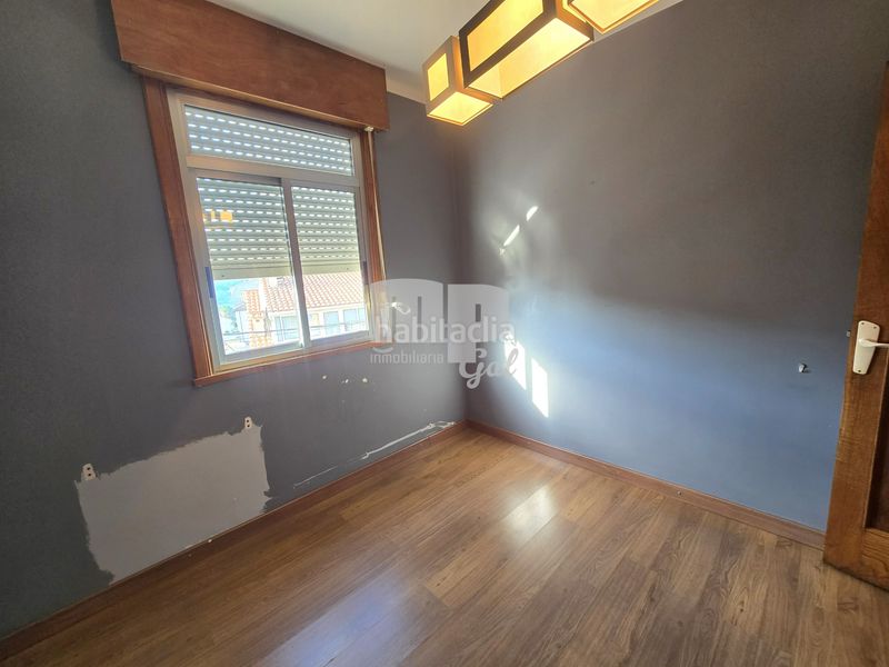 Foto b715a549-b56a-406a-889a-a385f67b0200. Casa adossada amb calefacció aparcament a Redondela