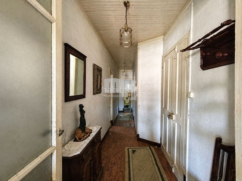 Foto e1f08e1a-4a0e-4fed-b128-dd15b851c144. Casa adossada a Redondela