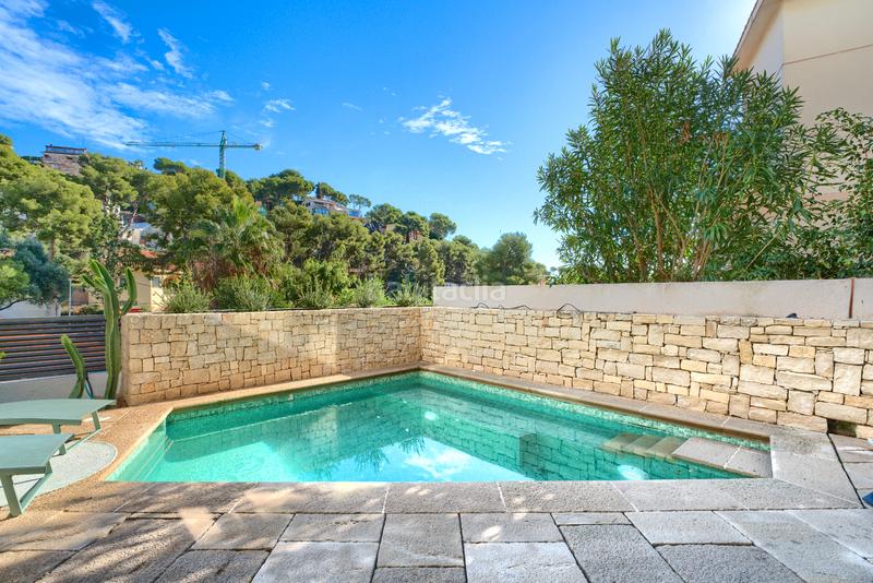 Foto d40b9322-b913-4ff0-ba46-9f28b467e7ea. Chalet with fireplace heating parking pool in Bellamar Castelldefels