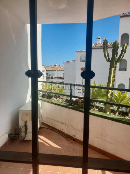 Foto b5fee63c-0840-4a00-8938-c4c3b88400a7. Piso ¡oportunidad, amplio piso con terraza, garaje y piscina ! en Benalmádena