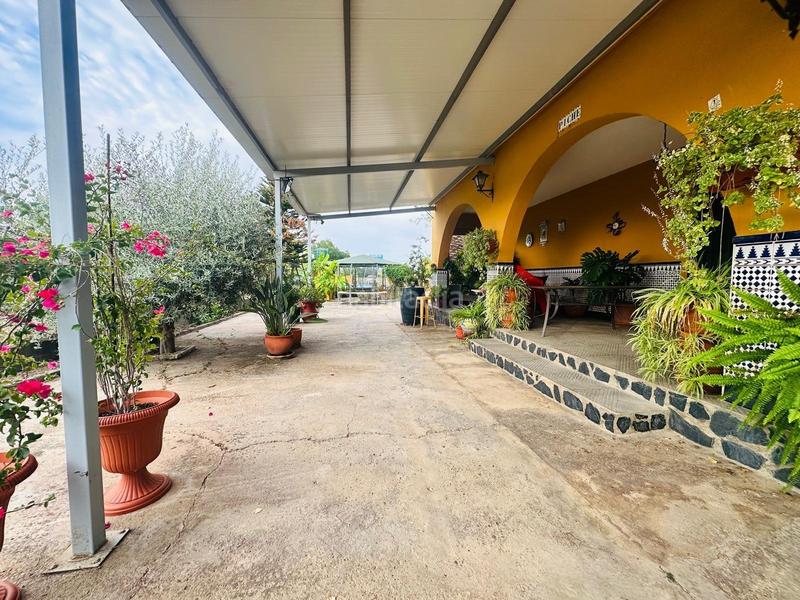 Foto d14dba21-8b43-4e44-853b-09dcb78ccb91. Bauernhof mit parking pool in Torremayor