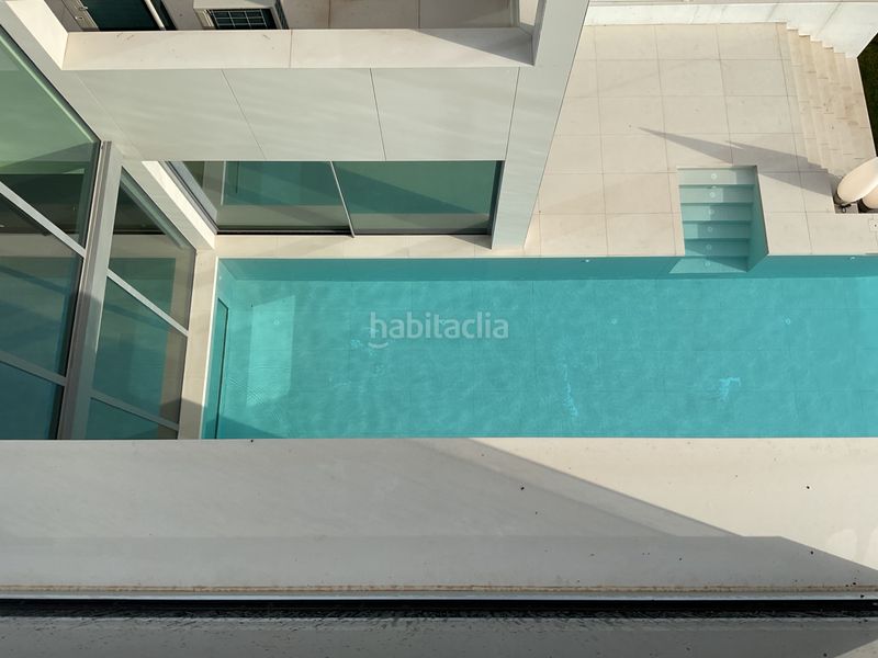 Foto 9a62fa7d-7f8a-426c-8d8e-96f2215660f7. Xalet amb xemeneia calefacció aparcament piscina a Barcelona