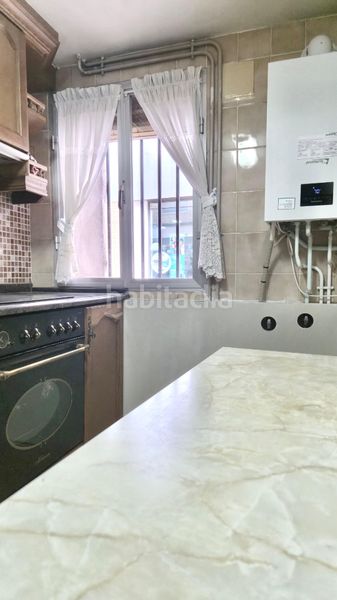 Foto 10f73450-5b0c-49da-aba7-9c8ea84889f7. Casa adossada amb xemeneia calefacció a Corella