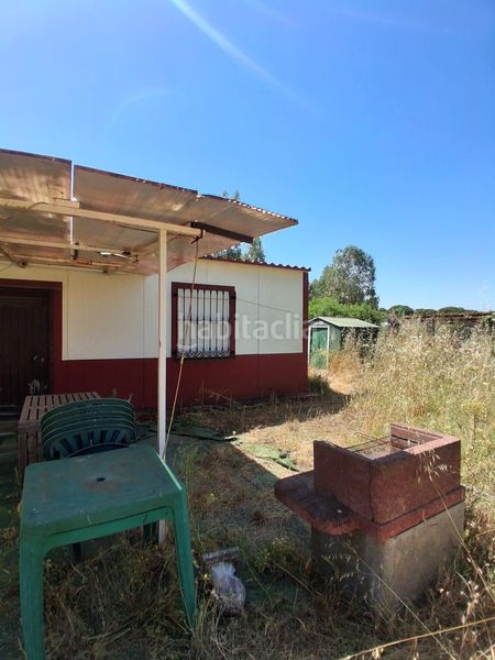 Foto 5226a25d-8637-4bf7-81e4-0221b4df1e30. Casa amb piscina a Puebla del Río (La)
